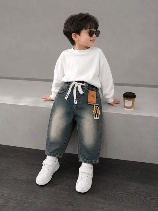 BOYS PREMIUM VINTAGE WASH BAGGY DENIM JEANS WITH CHARACTER PATCH | SIZES 18–26