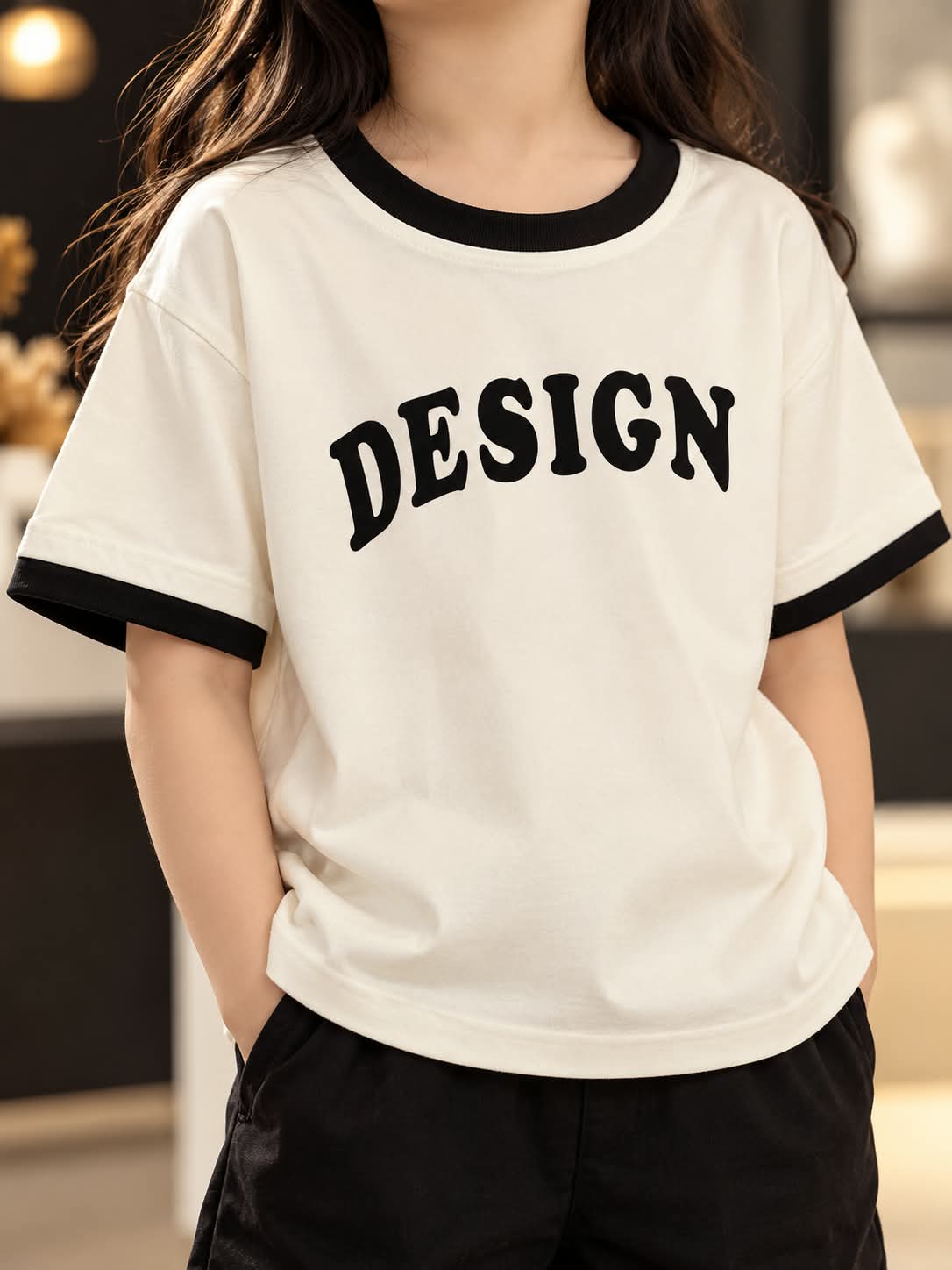 Girls White Oversized T-Shirt with Black Contrast Trim & Graphic Print | Sizes 24–36